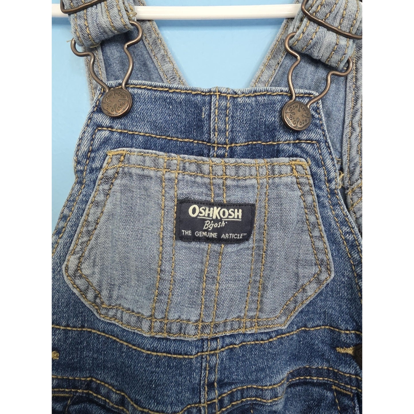 Oshkosh B’gosh baby 3m distressed denim overalls with light blue pocket vestbak